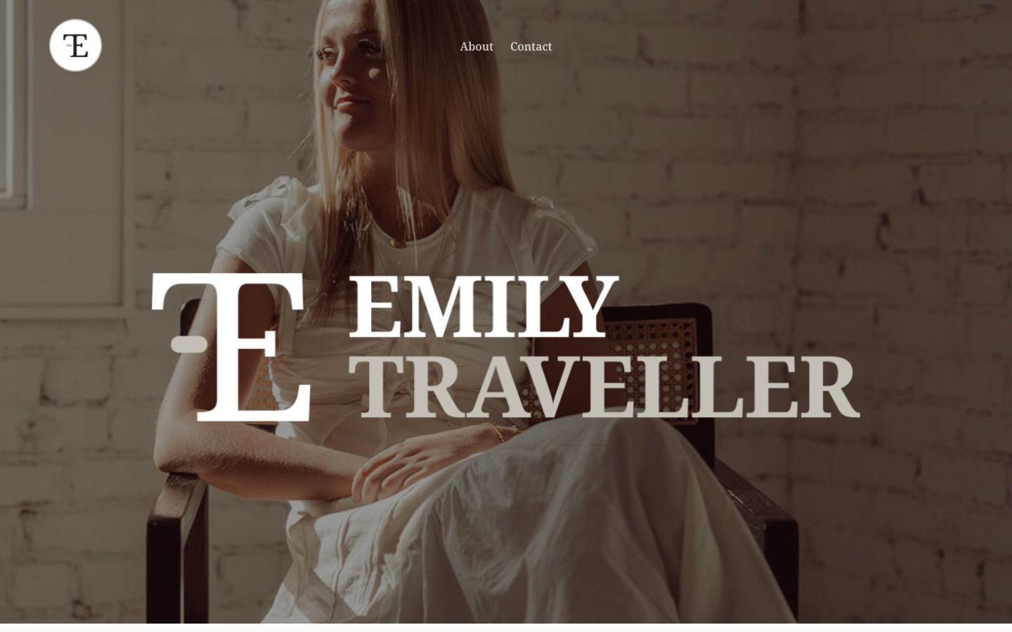 Emily Traveller homepage — story-forward with press features